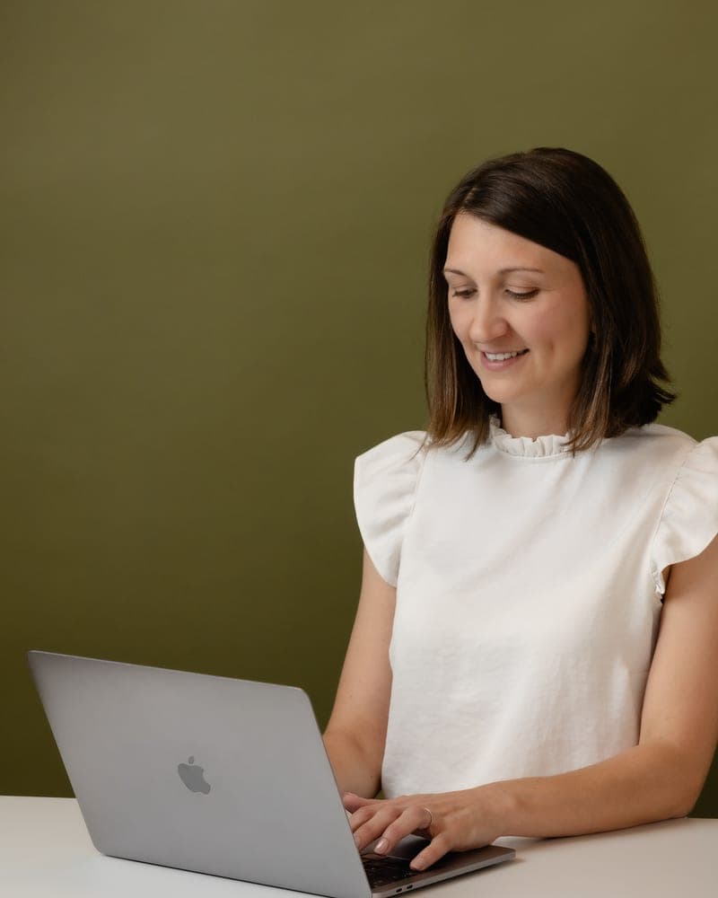 Marni working at a laptop